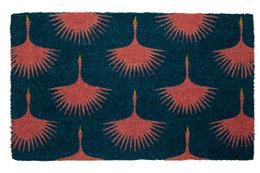 Rectangular coir doormat with a repeating pattern of large, vibrant red fan-shaped designs on a dark blue background. The doormat appears to be made of natural coir fibers and is suitable for outdoor use at the entrance of a home.