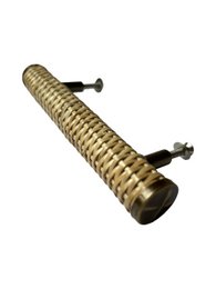  Rotan native round grip medium door knob, made of woven rattan material with a cylindrical shape.