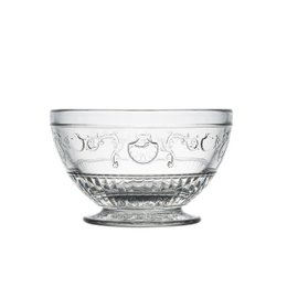 A clear glass bowl with an intricate floral pattern etched around the exterior. The bowl has a wide, shallow shape and a pedestal base, giving it a classic, elegant appearance.