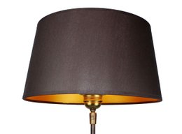 A black fabric lampshade with a gold interior, measuring 30/25/16 cm.