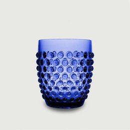 Acrylic drinking cup with a dotted, playful design in a vibrant blue color. Sustainable, lightweight, and unbreakable, making it ideal for use in the garden, on picnics, or anywhere you want a stylish yet durable drinkware option.