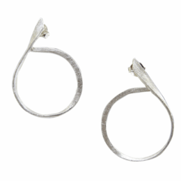 Silver ear studs with a simple, minimalist design. Made of high-quality metal with a sleek, brushed finish.