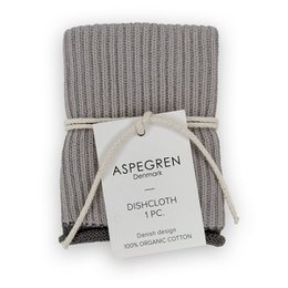  A grey knitted dishcloth with a ripple pattern and the brand name "ASPEGREN" printed on it. The dishcloth is made of 100% organic cotton.