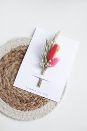 Vibrant floral arrangement featuring dried flowers, grasses, and a pink accent. Suitable for a friendship card or gift.