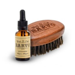 A wooden beard brush and a bottle of beard oil. The beard brush has the text "Barvo Pack Finish" printed on it, indicating it is a product for beard care. The beard oil bottle has a label with the brand name "Barvo".