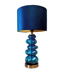  Tall, cylindrical table lamp with a blue glass base and a navy blue fabric shade.