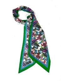 Green silk scarf with floral pattern, pink flowers, dark botanical print, long rectangular shape, elegant accessory.