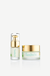 "Luxurious gold and white skincare duo, eye and face treatment set with premium packaging"