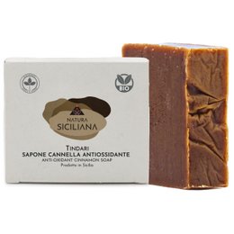 Cinnamon-scented antioxidant soap bar with natural ingredients for cleansing and nourishing skin.