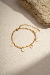  Stainless steel charm bracelet in gold and silver tones, featuring a delicate chain with hanging charms.