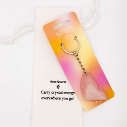 Rose quartz keychain with a metal ring and chain, designed to carry with you wherever you go.