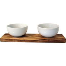  Two white porcelain bowls on an olive wood base, suitable for use as soap dishes.