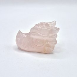  Rose quartz dragon skull figurine, 4 cm in size, made of natural gemstone material.