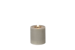 A round, tall, gray LED candle with a rustic design. The candle measures 7.5 cm in diameter and 8 cm in height.