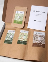  Japanese tea box set with matcha, green tea, dried flowers, kraft packaging, traditional Asian tea collection.