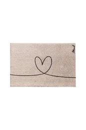 Plush, beige bath mat with a simple heart design. Soft, absorbent material suitable for bathroom use.