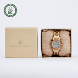 "Handmade recycled natural wood wristwatch with a round, wooden case and a textured dial featuring a leaf design. The watch has a simple, minimalist style and is suitable for casual or formal wear."