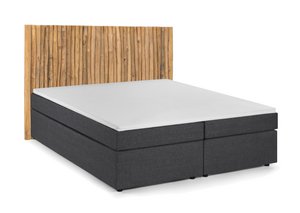 Boxspringbed met hoofdbord gemaakt van takken