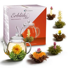 Assorted tea flower blooms in a glass teapot, with a gift set box. The tea flowers are vibrant yellow, orange, and pink in color, creating a visually appealing display.