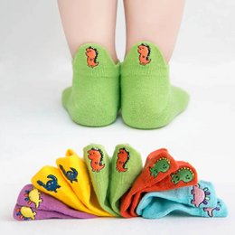Kids Dino Tongue Socks (Pack of 5 pairs) - Colorful, fun socks featuring dinosaur tongue designs in various sizes for children.

The Kids Dino Tongue Socks (Pack of 5 pairs) are a playful and vibrant set of children's socks. The socks feature a dinosaur tongue design in bright, contrasting colors such as green, yellow, and purple. The socks come in a variety of sizes to fit kids from 12 months up to 12 years old. These comfortable, cotton-blend socks are perfect for adding a touch of whimsical style to any child's wardrobe.
