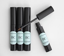 Eyelash serum in a black tube with a green label. The serum is designed to enhance and condition eyelashes.