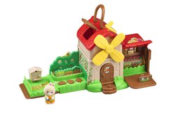  Colorful, whimsical playset with a windmill, house, and various accessories. Includes a variety of shapes, textures, and details that could be useful for product search and discovery.