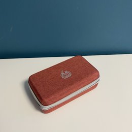 Terracotta essential oil kit with 18 essential oils in a compact, portable case. Includes a variety of natural scents for aromatherapy and wellness.