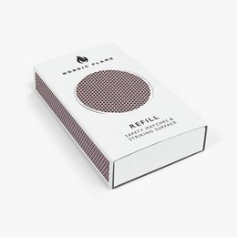 Matchbox refill for matches, rectangular box with a dotted pattern design in shades of red and white.