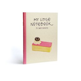 A small notebook with a pink cover featuring an illustration of a sweet pastry. The notebook has a cream-colored background with a floral pattern.