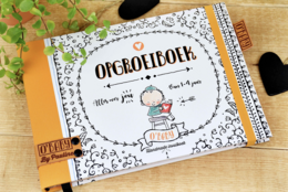 A colorful children's book titled "Opgrowboek" with illustrations of a young child. The book appears to be about a child's growth and development.