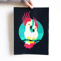 Handprinted woodcut print with two cockatoos (black), a vibrant and colorful painting featuring two cockatoos with striking pink crests against a dark background.