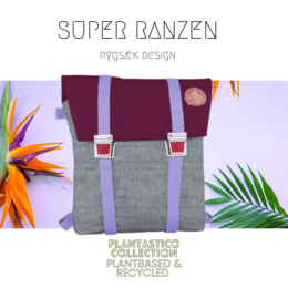 A lilac-colored denim school bag with gray accents and colorful straps. The bag features a playful, whimsical design with a sustainable and recycled construction.