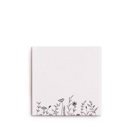 Floral notepad with delicate flower illustrations on a white background. Ideal for writing, journaling, or note-taking.