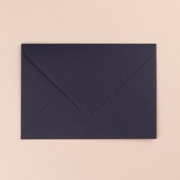 A navy blue envelope with a simple, minimalist design. The envelope appears to be made of high-quality paper or cardstock, suitable for use as a greeting card or invitation.