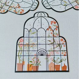 Colorful butterfly-themed puzzle with intricate floral patterns and shapes.