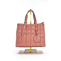 A pink quilted leather handbag with a structured silhouette, dual top handles, and a detachable shoulder strap. The bag features a gold-tone hardware and a circular logo charm.