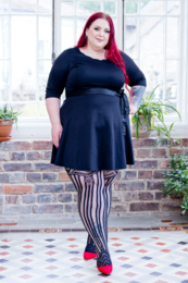  Plus-size black dress with fishnet pattern, available in 3XL and 4XL sizes.