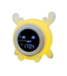  A yellow alarm clock with antlers, designed to help children sleep better and wake up more easily. The clock features a digital display and a friendly, cartoon-like design.