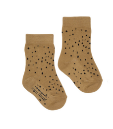 Soft, comfortable baby socks in a light green color with a dotted pattern. Suitable for infants aged 0-9 months.