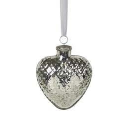 Silver heart-shaped decorative ornament with a shimmering, textured surface.