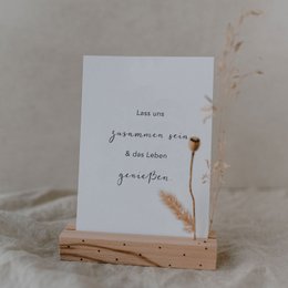 A set of greeting cards with handwritten text and floral illustrations. The cards feature messages about being together, love, and gratitude.