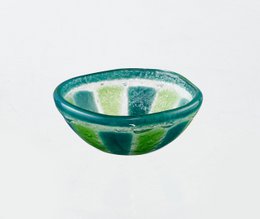  Small green and lime colored bowl with a tropical, citrus-inspired design.