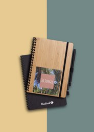 Hardcover, softcover, and softcover A6 notebooks with a minimalist design featuring a wooden cover and spiral binding.