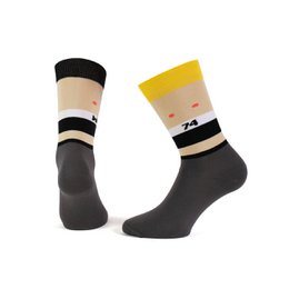 Striped socks in black, white, and yellow with the number 74 printed on them.