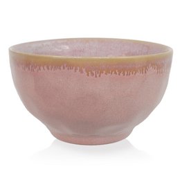  A round, shallow stoneware bowl with a soft pink glaze. The bowl has a simple, minimalist design that would complement a variety of home decor styles.