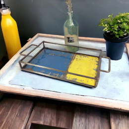 Upcycled serving tray made from recycled oil drums, available in a variety of vibrant color combinations including red, turquoise, black, blue, green, yellow, and more. The tray measures approximately 30cm x 20cm in size.