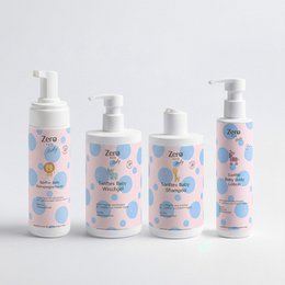  Baby care set with colorful polka dot pattern, gentle shampoo and wash bottles, soft pink and blue design for newborns.