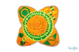 Colorful butterfly-shaped pet toy with textured patterns and shapes in orange, green, and yellow. Suitable for dogs to play with and chew on.