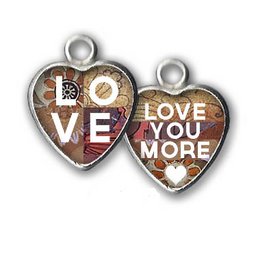 Heart-shaped pendant with "LOVE YOU MORE" text and decorative elements.