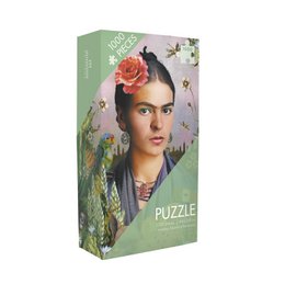 1000-piece jigsaw puzzle featuring a colorful portrait of Frida Kahlo surrounded by nature and floral elements. The puzzle is part of a collection celebrating the iconic Mexican artist.